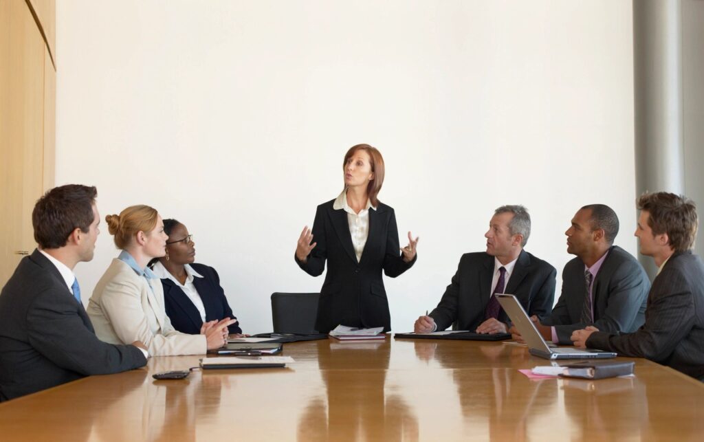 A woman talking in a business meeting